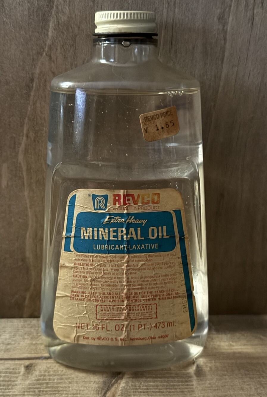 REVCO Extra Heavy Mineral Oil - Antique Bottle Partial Contents - Paper Labels